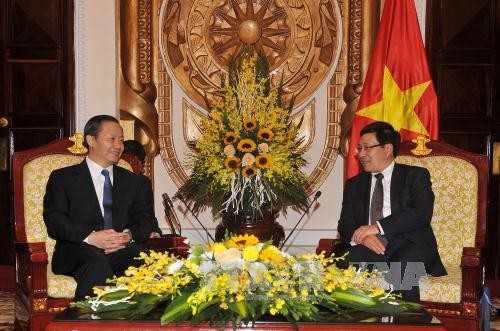 Phó Thủ tướng, Bộ trưởng Bộ Ngoại giao Phạm Bình Minh tiếp Bí thư khu ủy Quảng Tây, Trung Quốc - ảnh 1